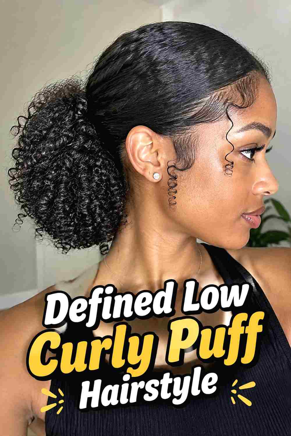 6. Defined Low Curly Puff Hairstyle