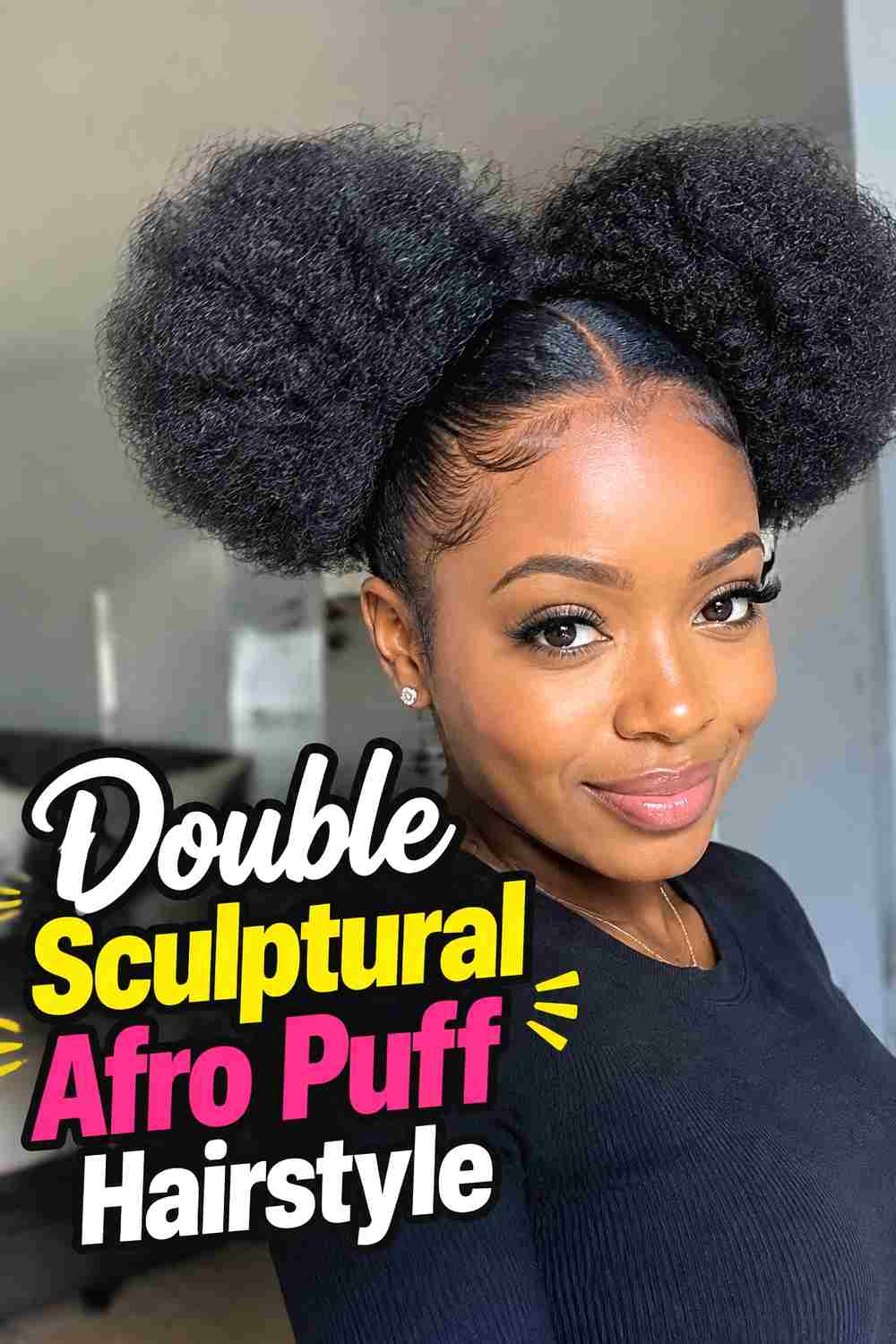 2. Double Sculptural Afro Puff Hairstyle