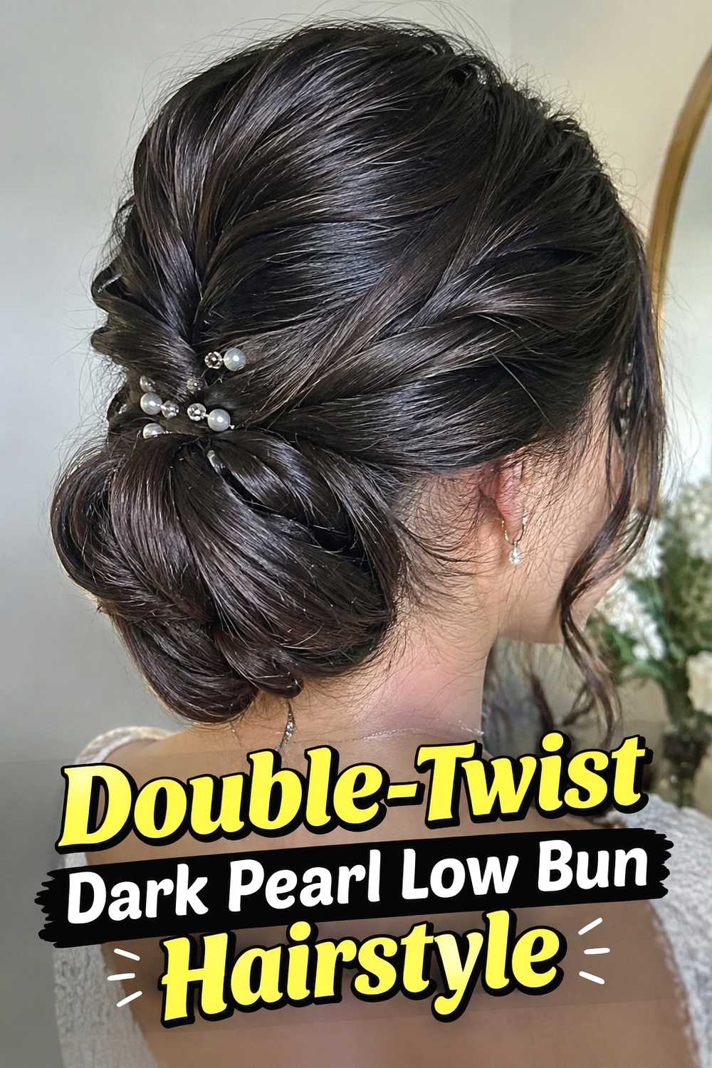 11. Double Twist Dark Pearl Low Bun Hairstyle