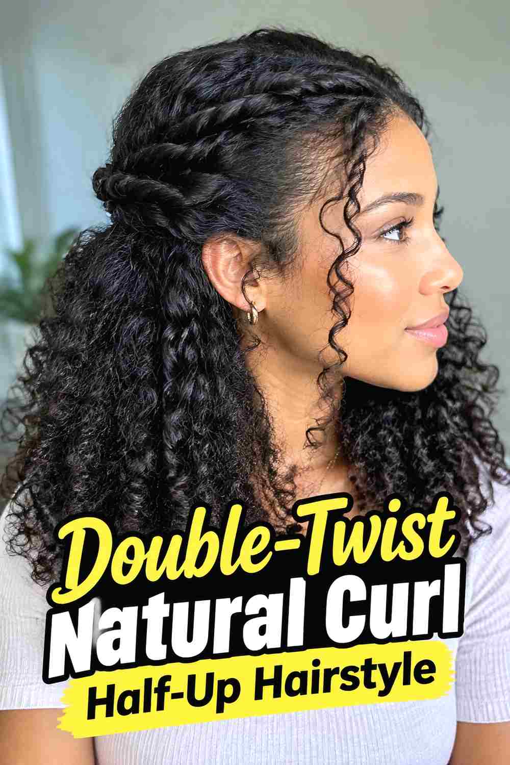 9. Double Twist Natural Curl Half Up Hairstyle