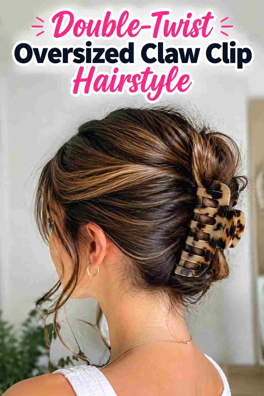 11. Double Twist Oversized Claw Clip Hairstyle