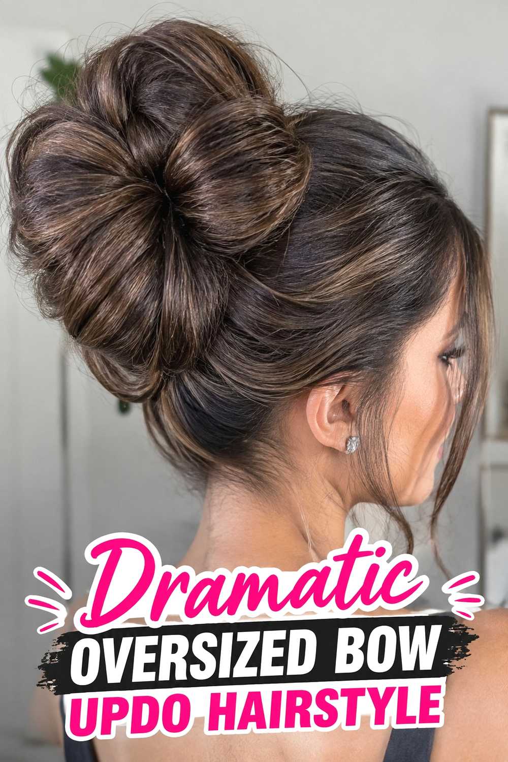 15. Dramatic Oversized Bow Updo Hairstyle