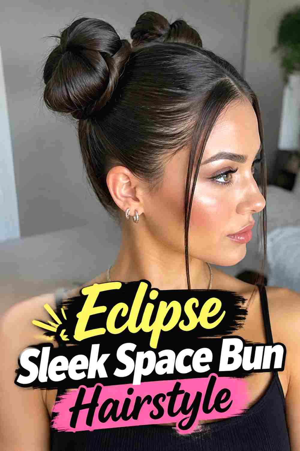 13. Eclipse Sleek Space Bun Hairstyle