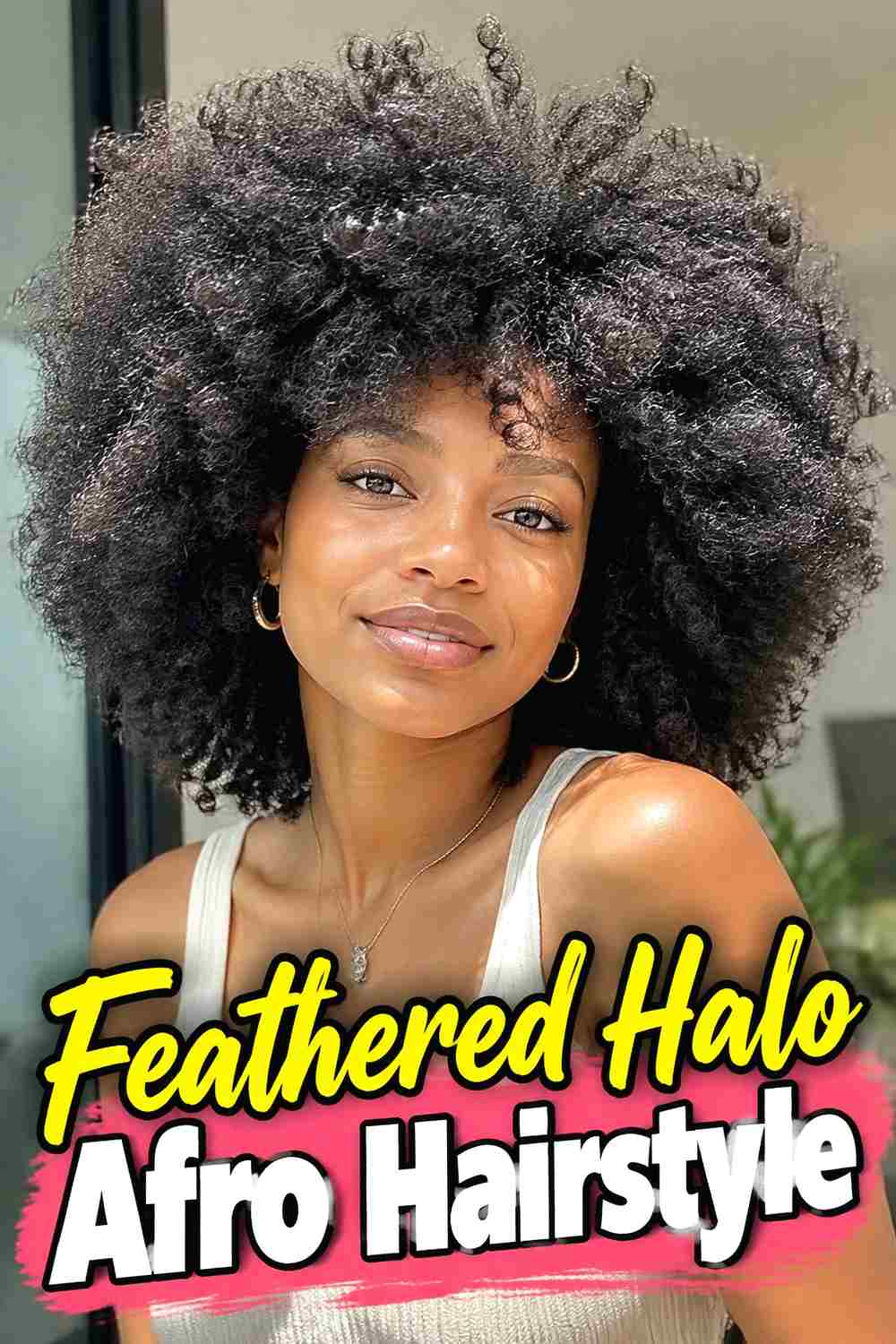 2. Feathered Halo Afro Hairstyle