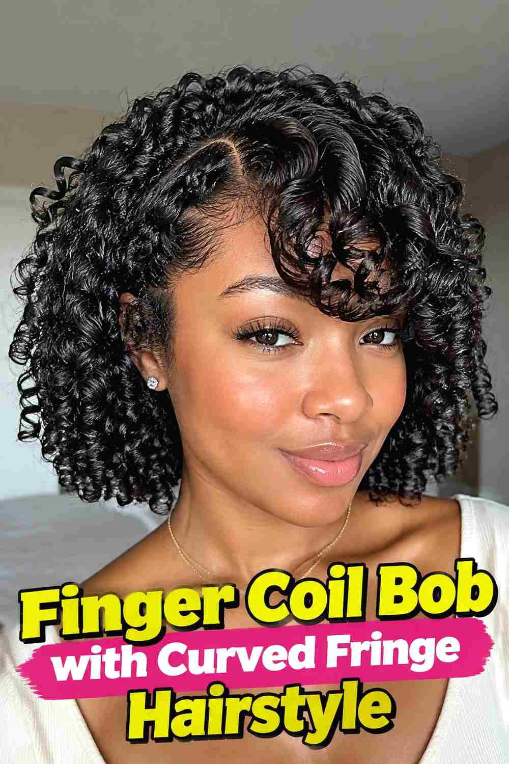 13. Finger Coil Bob With Curved Fringe Hairstyle