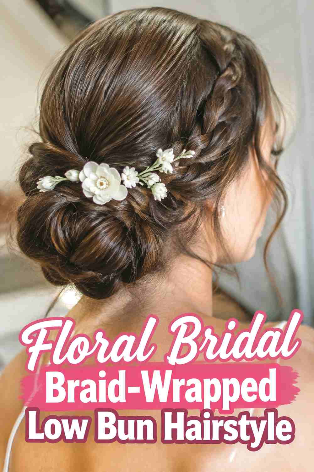 13. Floral Bridal Braid Wrapped Low Bun Hairstyle
