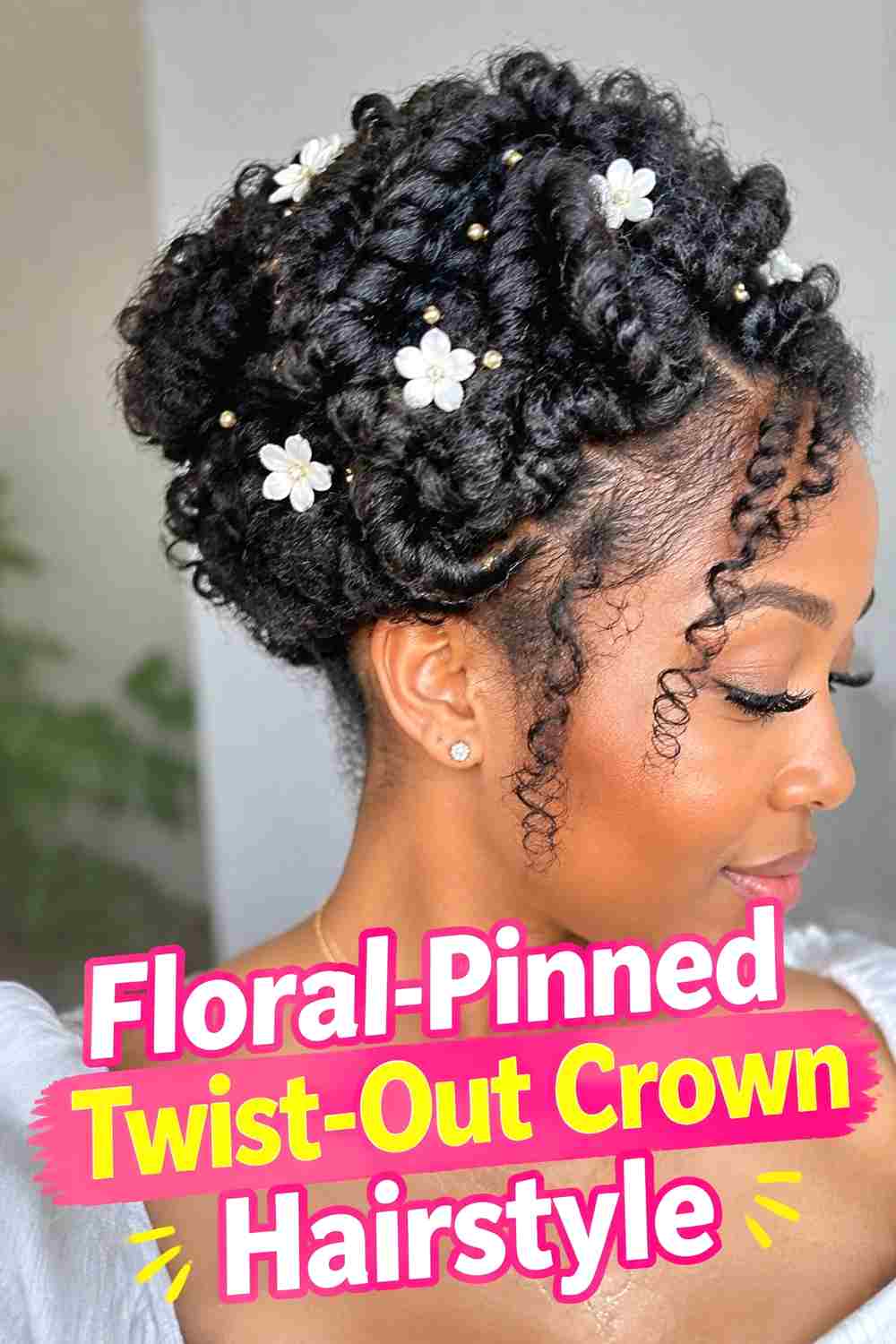 17. Floral Pinned Twist Out Crown Hairstyle