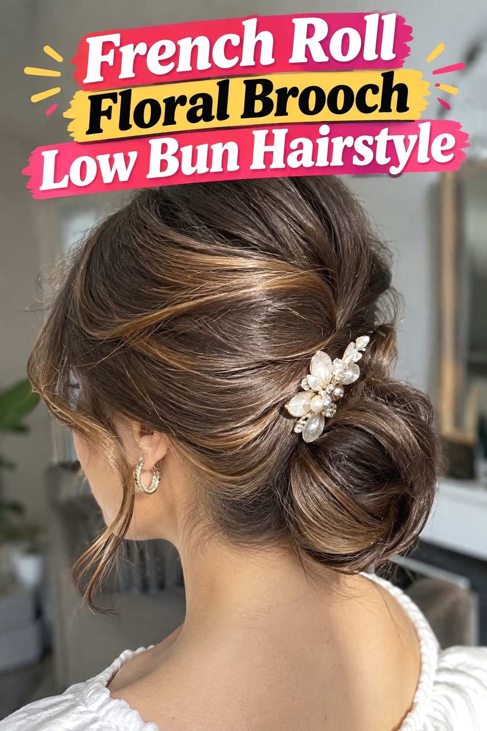 14. French Roll Floral Brooch Low Bun Hairstyle
