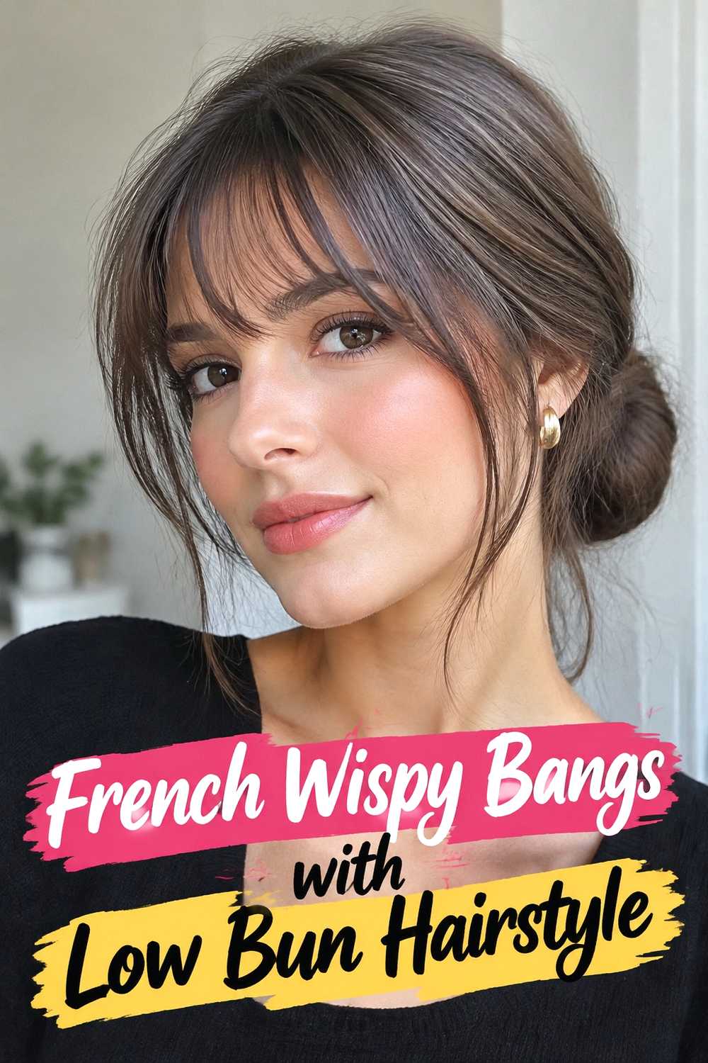 14. French Wispy Bangs With Low Bun Hairstyle