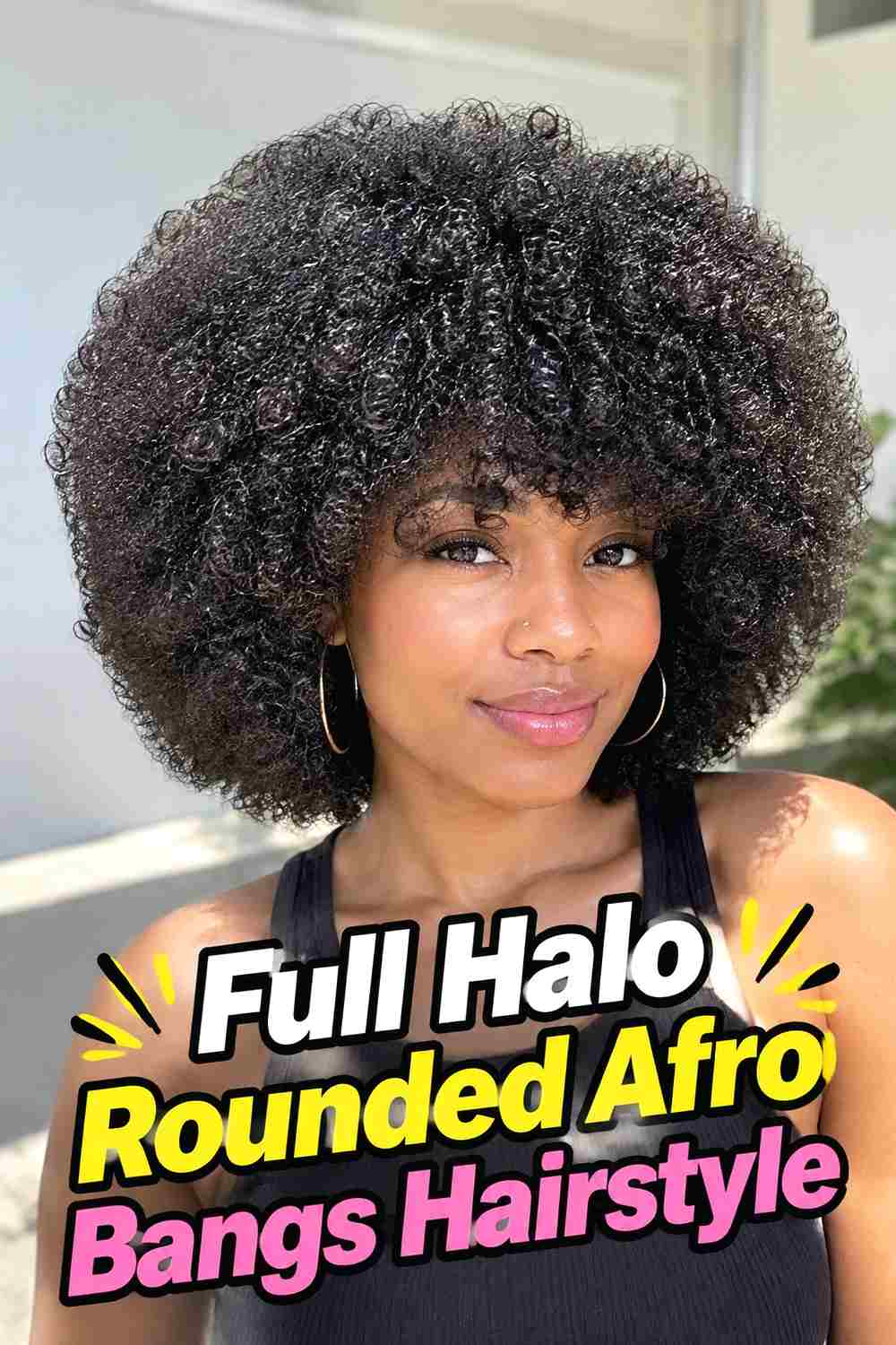 2. Full Halo Rounded Afro Bangs Hairstyle