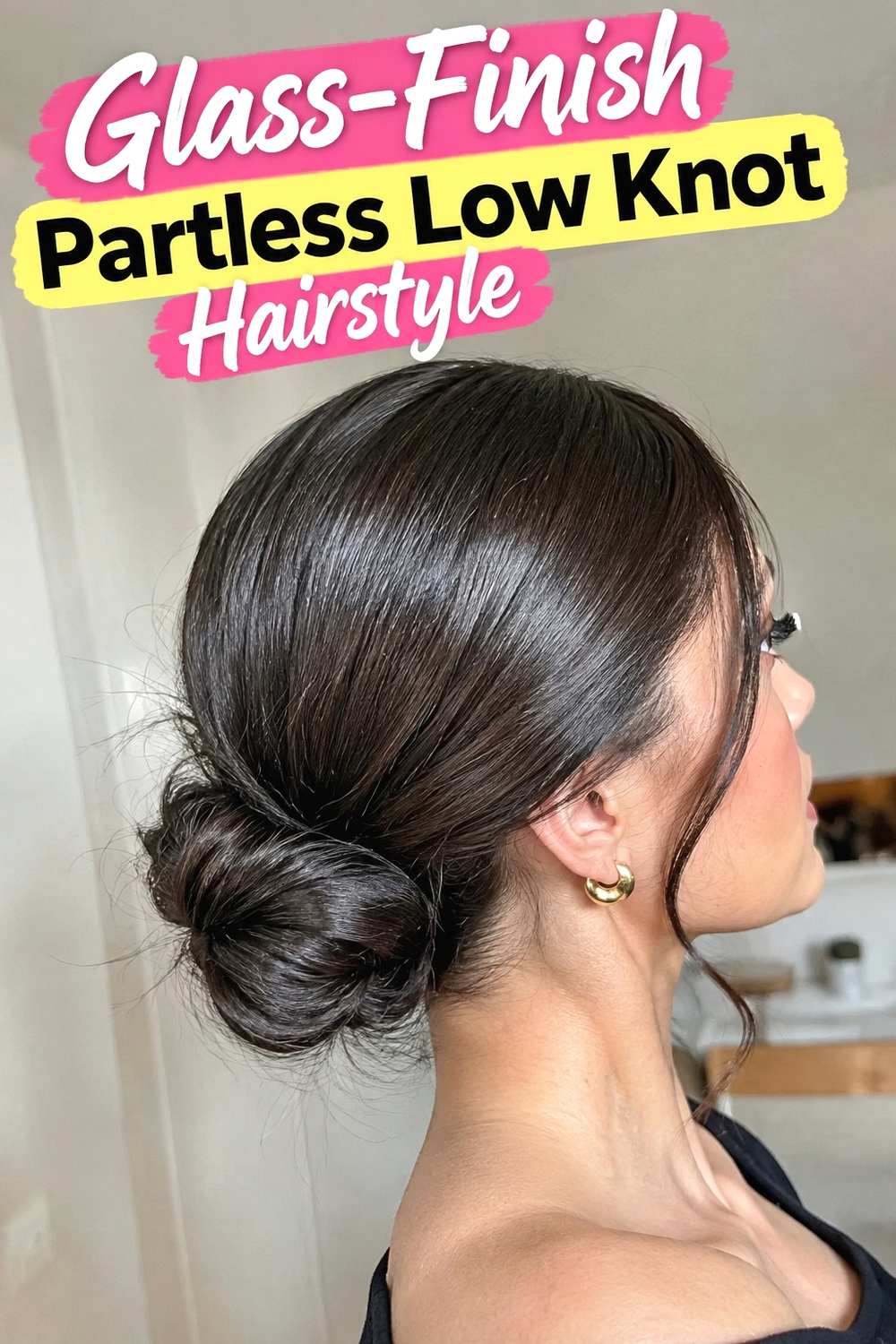 2. Glass Finish Partless Low Knot Hairstyle