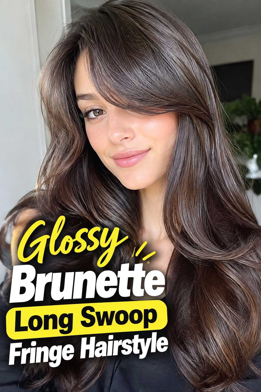 14. Glossy Brunette Long Swoop Fringe Hairstyle