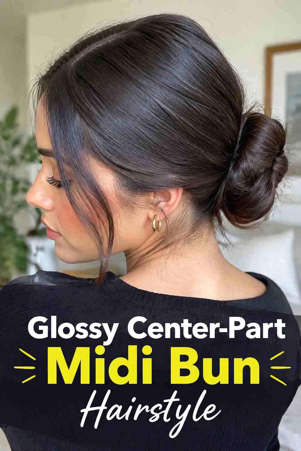 6. Glossy Center Part Midi Bun Hairstyle