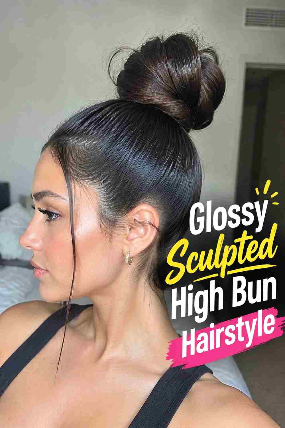 8. Glossy Sculpted High Bun Hairstyle