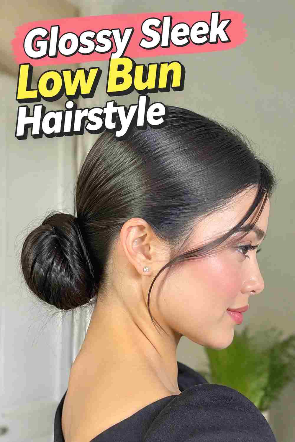 5. Glossy Sleek Low Bun Hairstyle