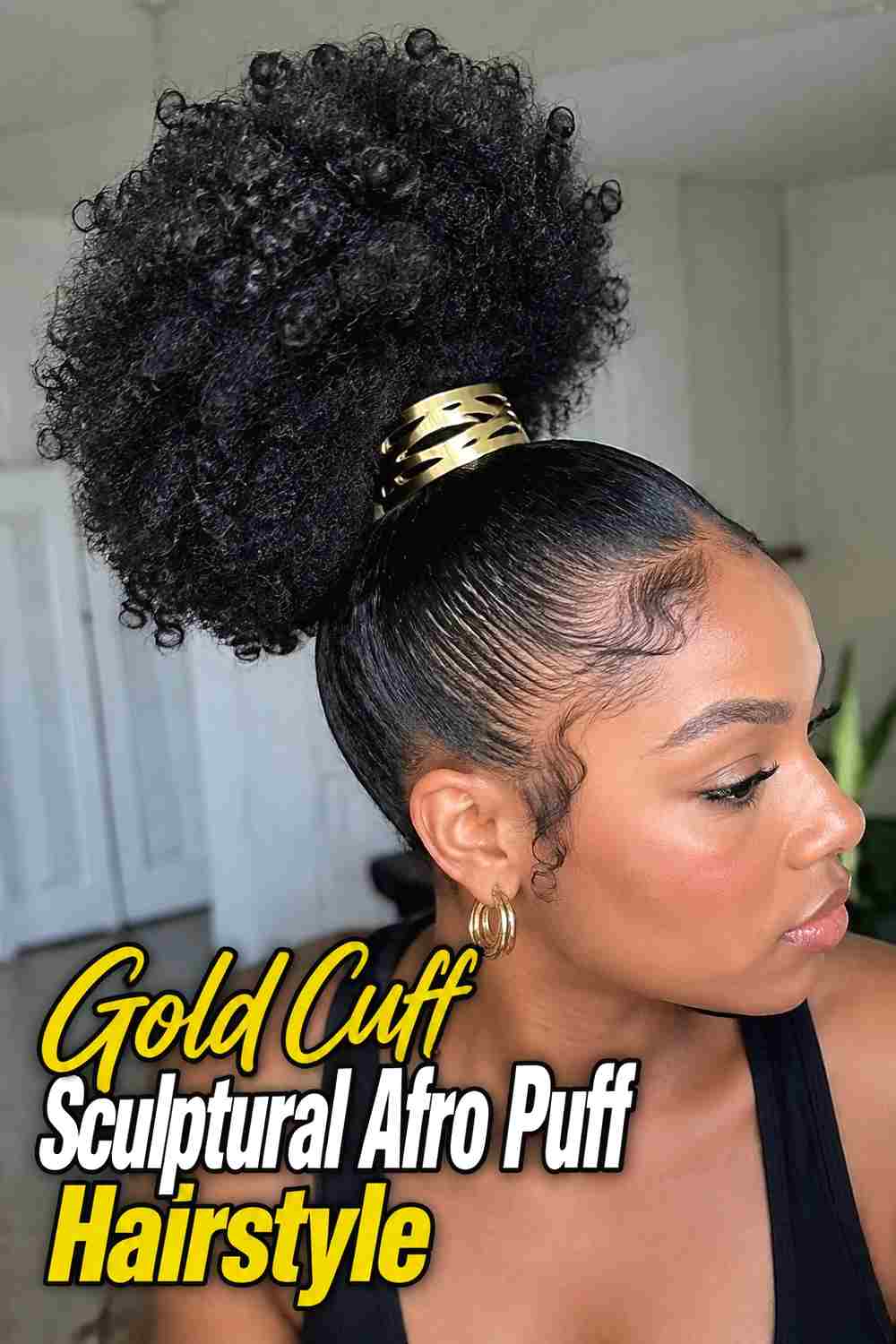16. Gold Cuff Sculptural Afro Puff Hairstyle