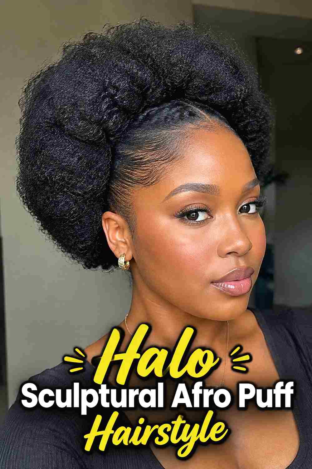 7. Halo Sculptural Afro Puff Hairstyle