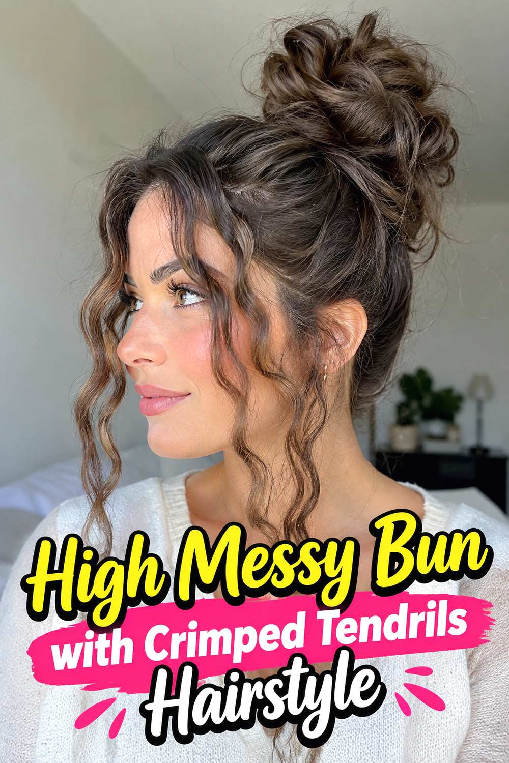 High Messy Bun with Crimped Tendrils Hairstyle