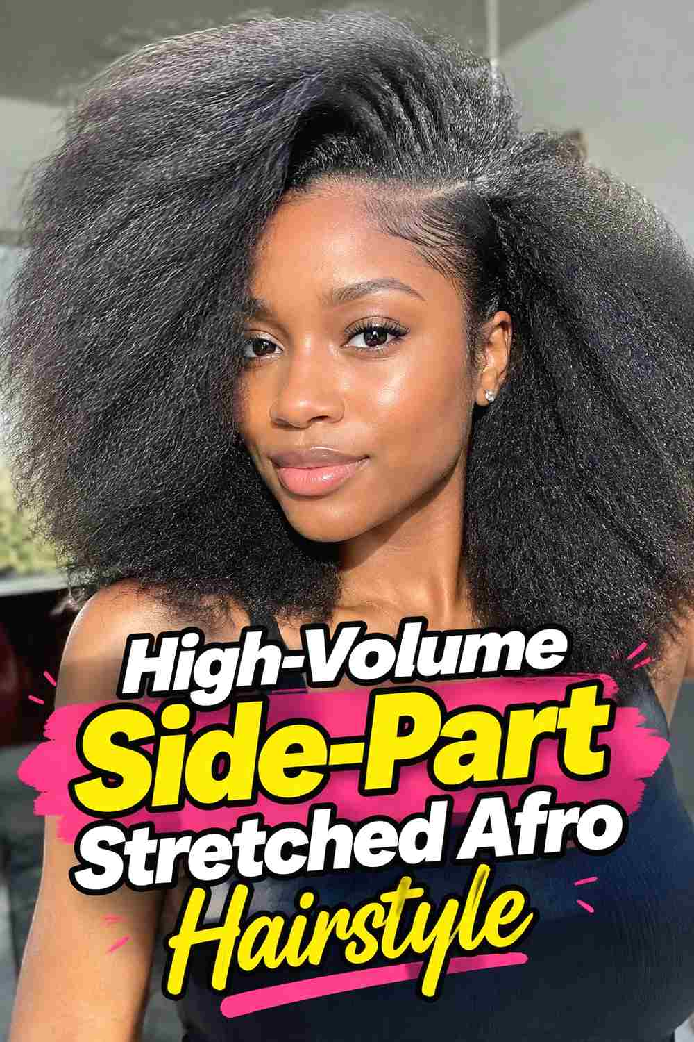 3. High Volume Side Part Stretched Afro Hairstyle