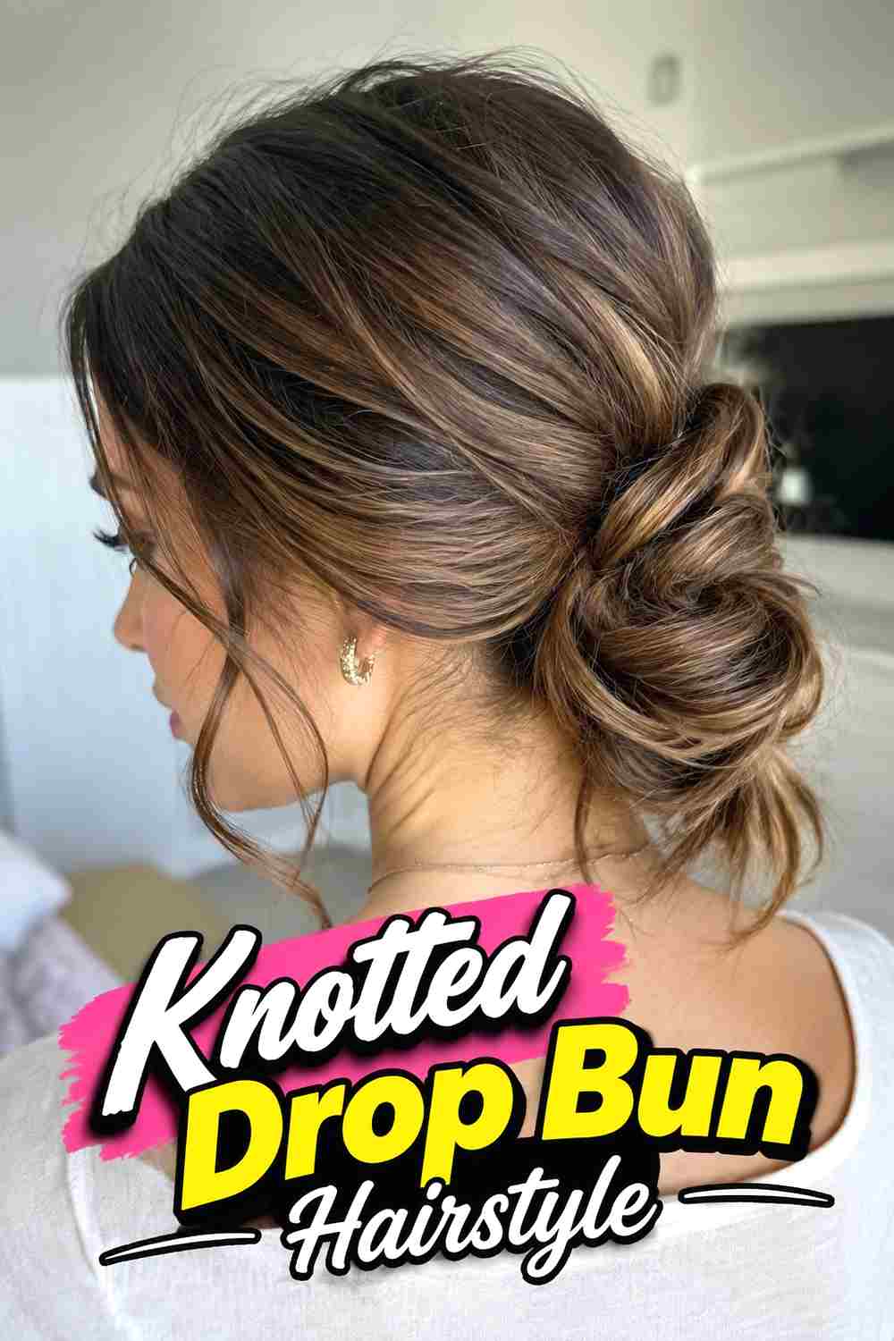 8. Knotted Drop Bun Hairstyle