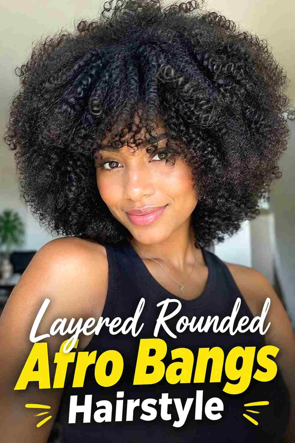 11. Layered Rounded Afro Bangs Hairstyle