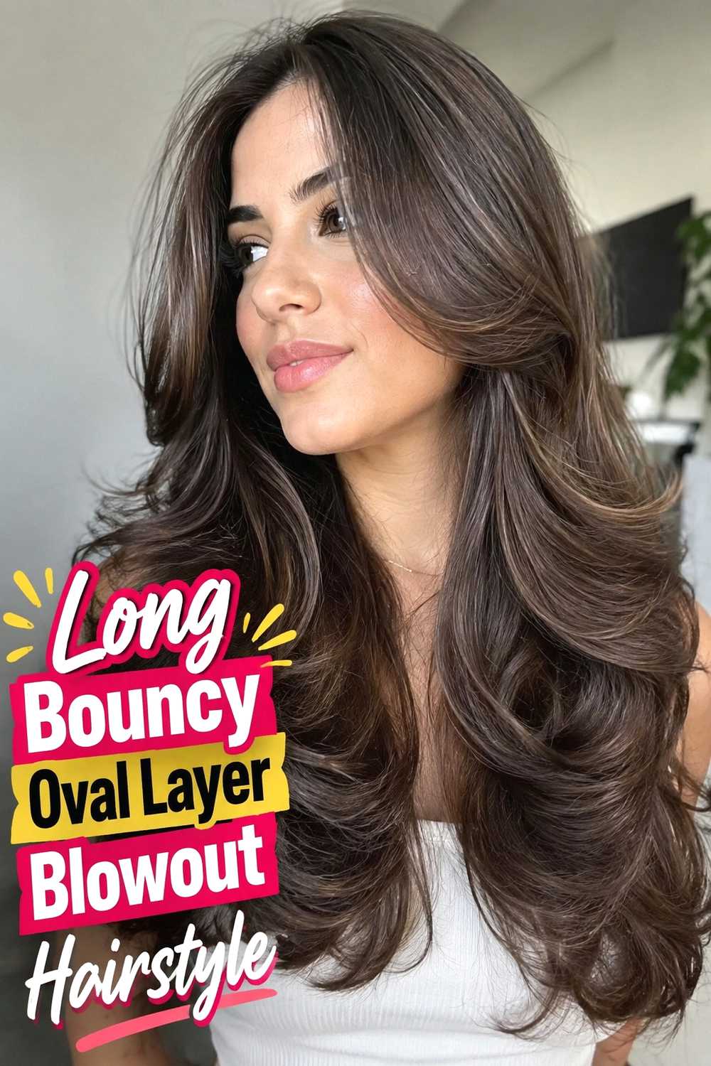 2. Long Bouncy Oval Layer Blowout Hairstyle