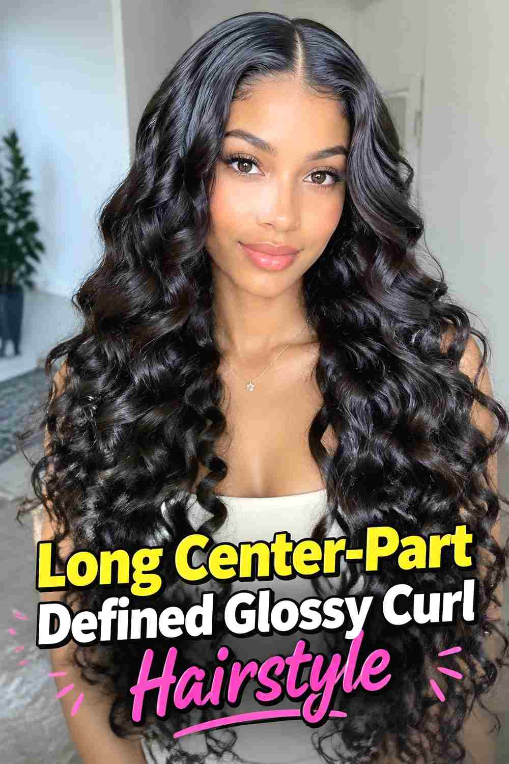 1. Long Center Part Defined Glossy Curl Hairstyle