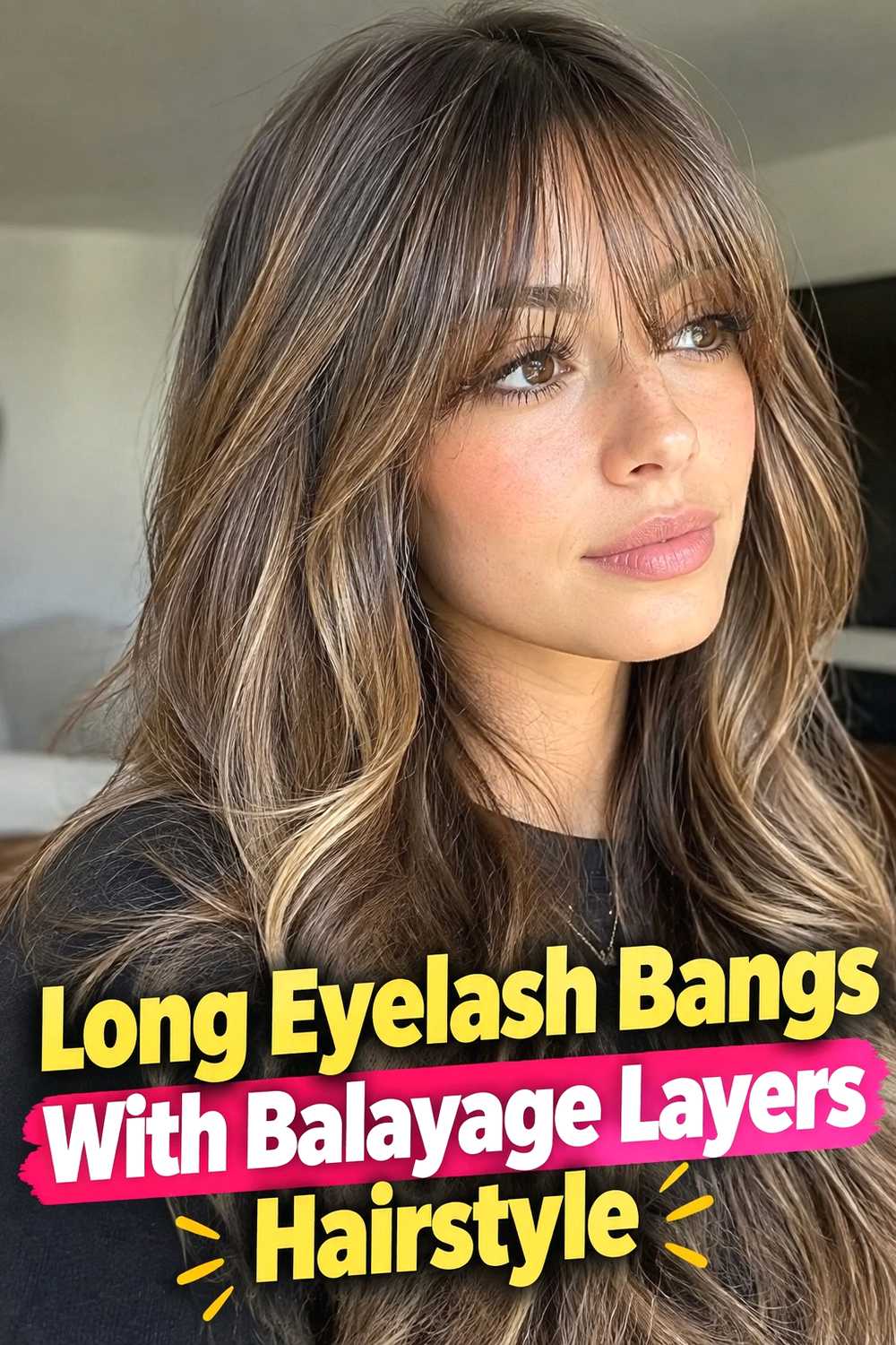 17. Long Eyelash Bangs With Balayage Layers Hairstyle