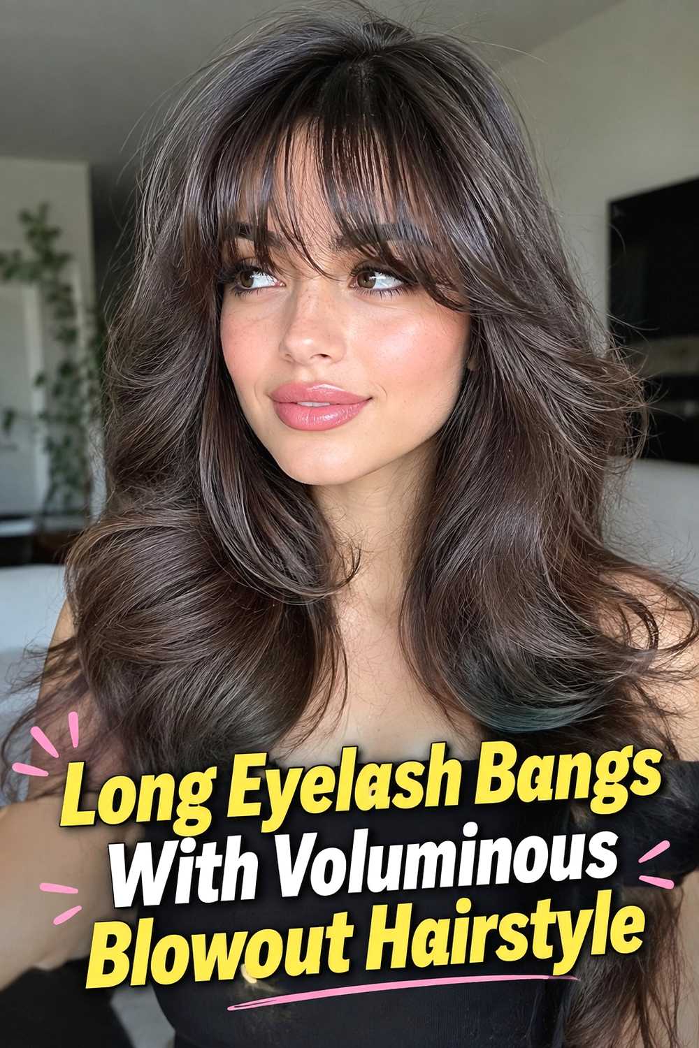 15. Long Eyelash Bangs With Voluminous Blowout Hairstyle