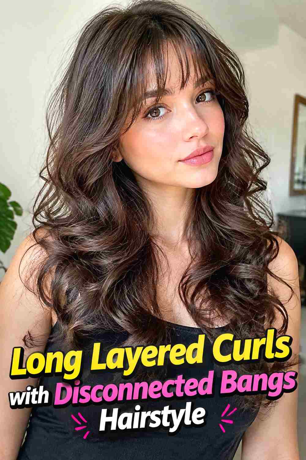 3. Long Layered Curls With Disconnected Bangs Hairstyle