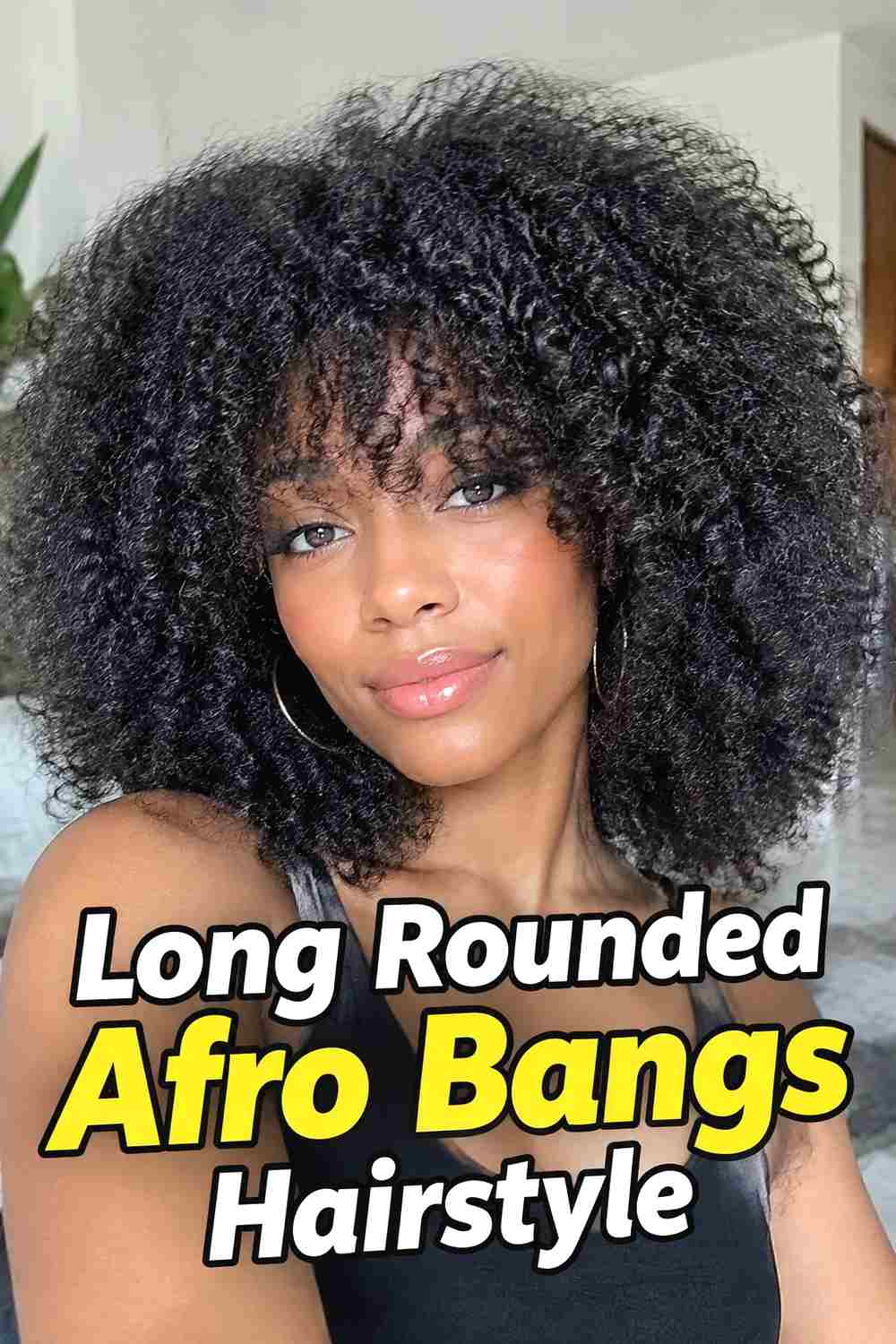 5. Long Rounded Afro Bangs Hairstyle