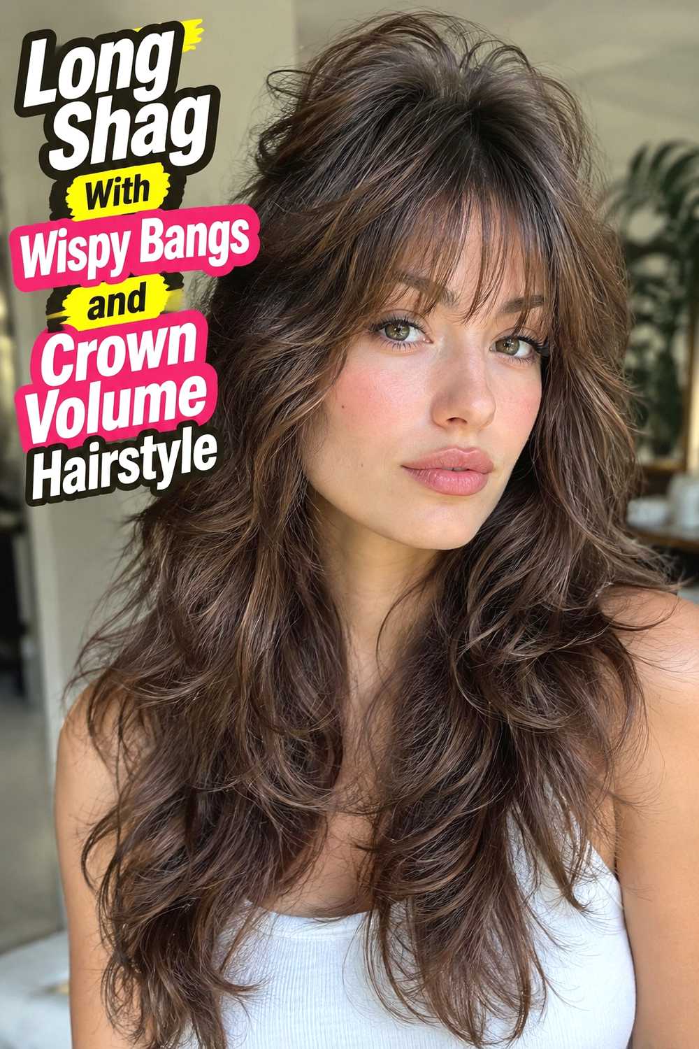 16. Long Shag With Wispy Bangs And Crown Volume Hairstyle