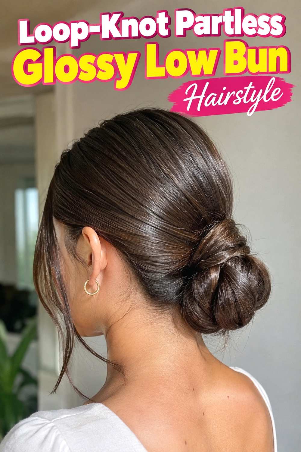 12. Loop Knot Partless Glossy Low Bun Hairstyle