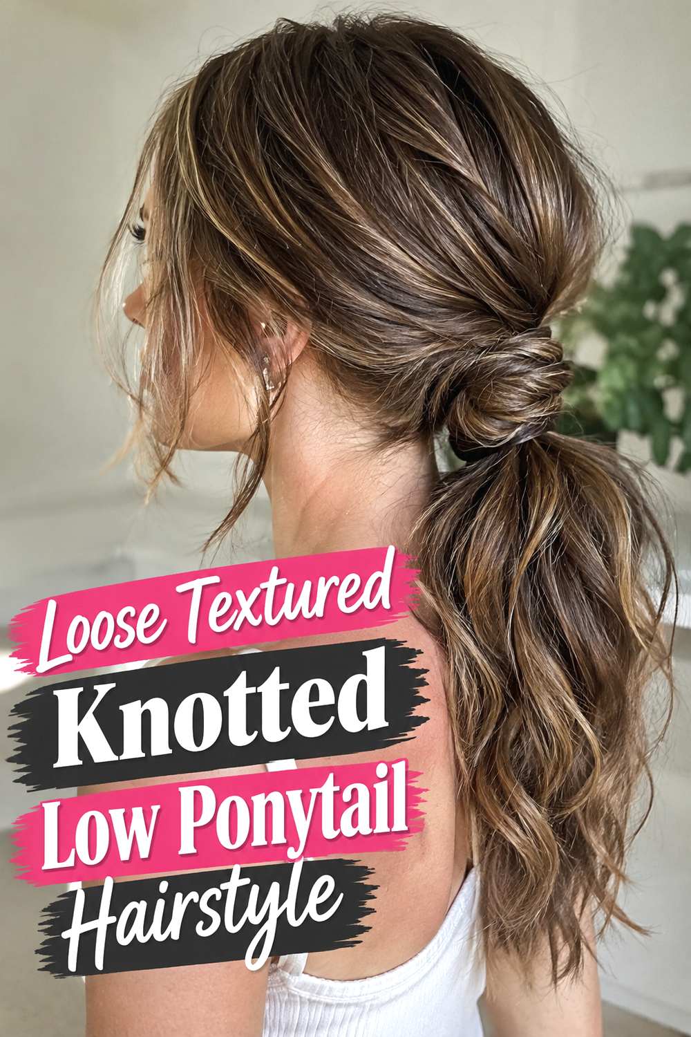 Loose Textured Knotted Low Ponytail Hairstyle