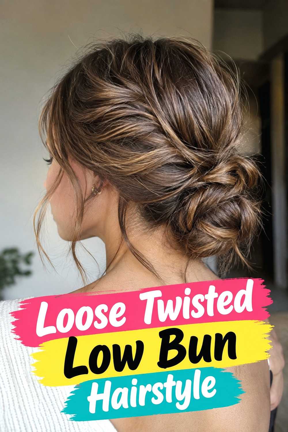 10. Loose Twisted Low Bun Hairstyle