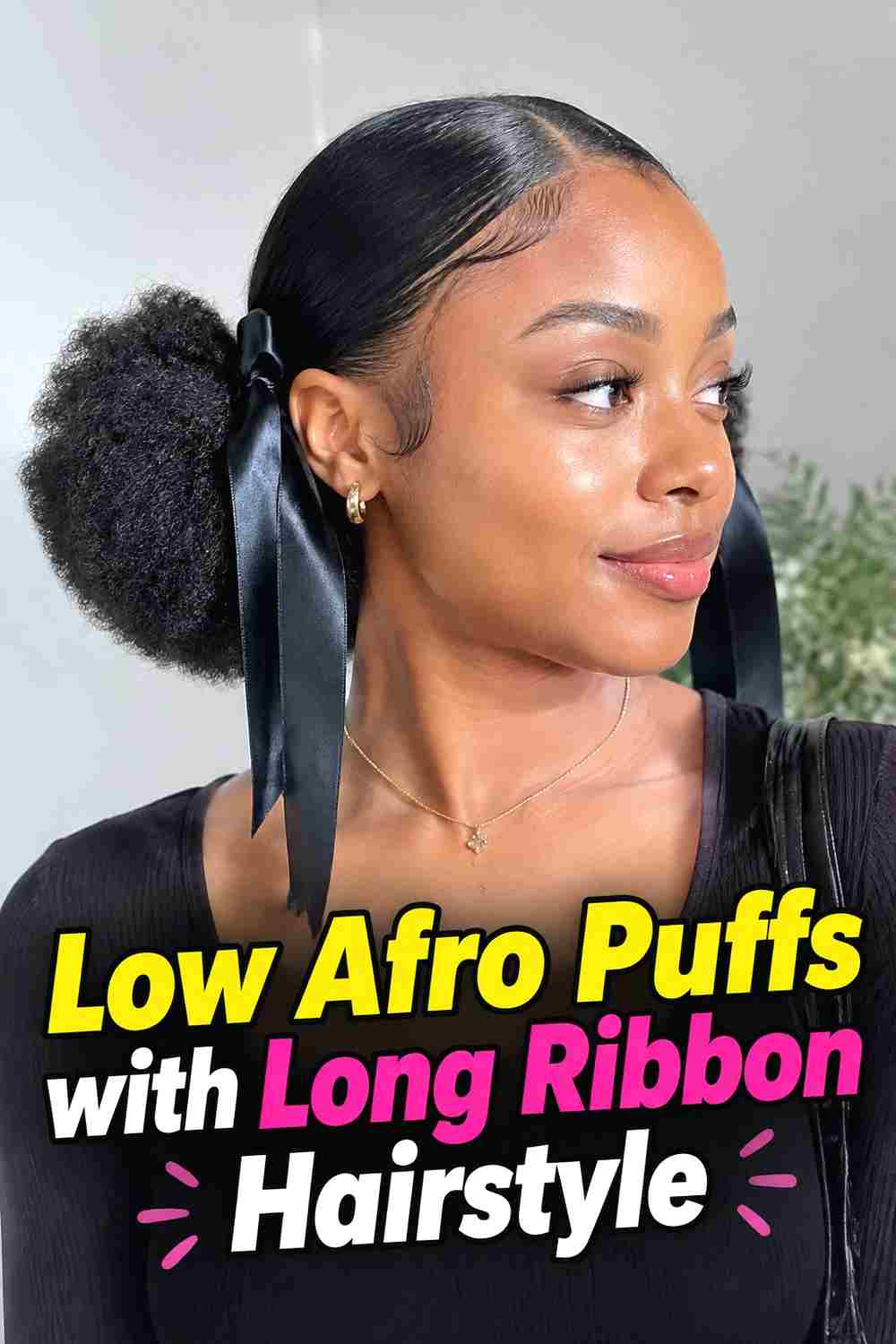 3. Low Afro Puffs With Long Ribbon Hairstyle
