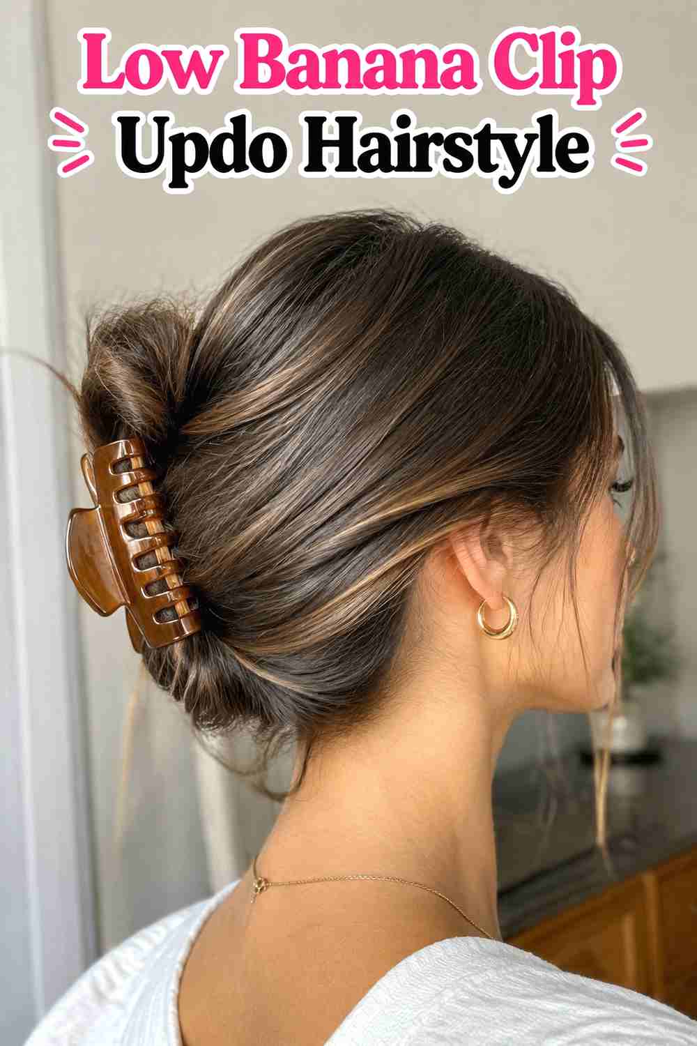 2. Low Banana Clip Updo Hairstyle