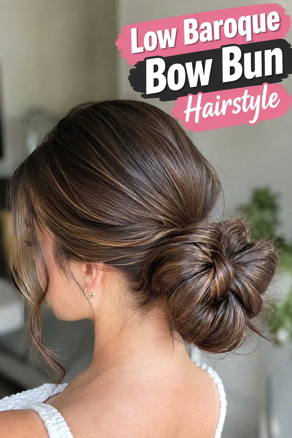 3. Low Baroque Bow Bun Hairstyle