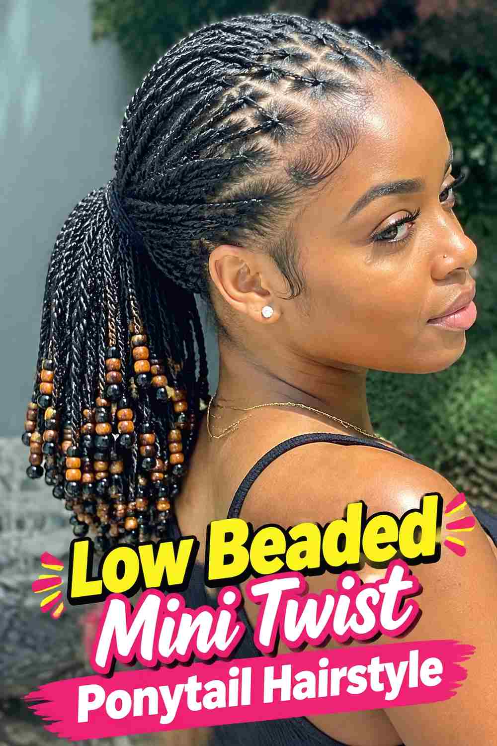 2. Low Beaded Mini Twist Ponytail Hairstyle