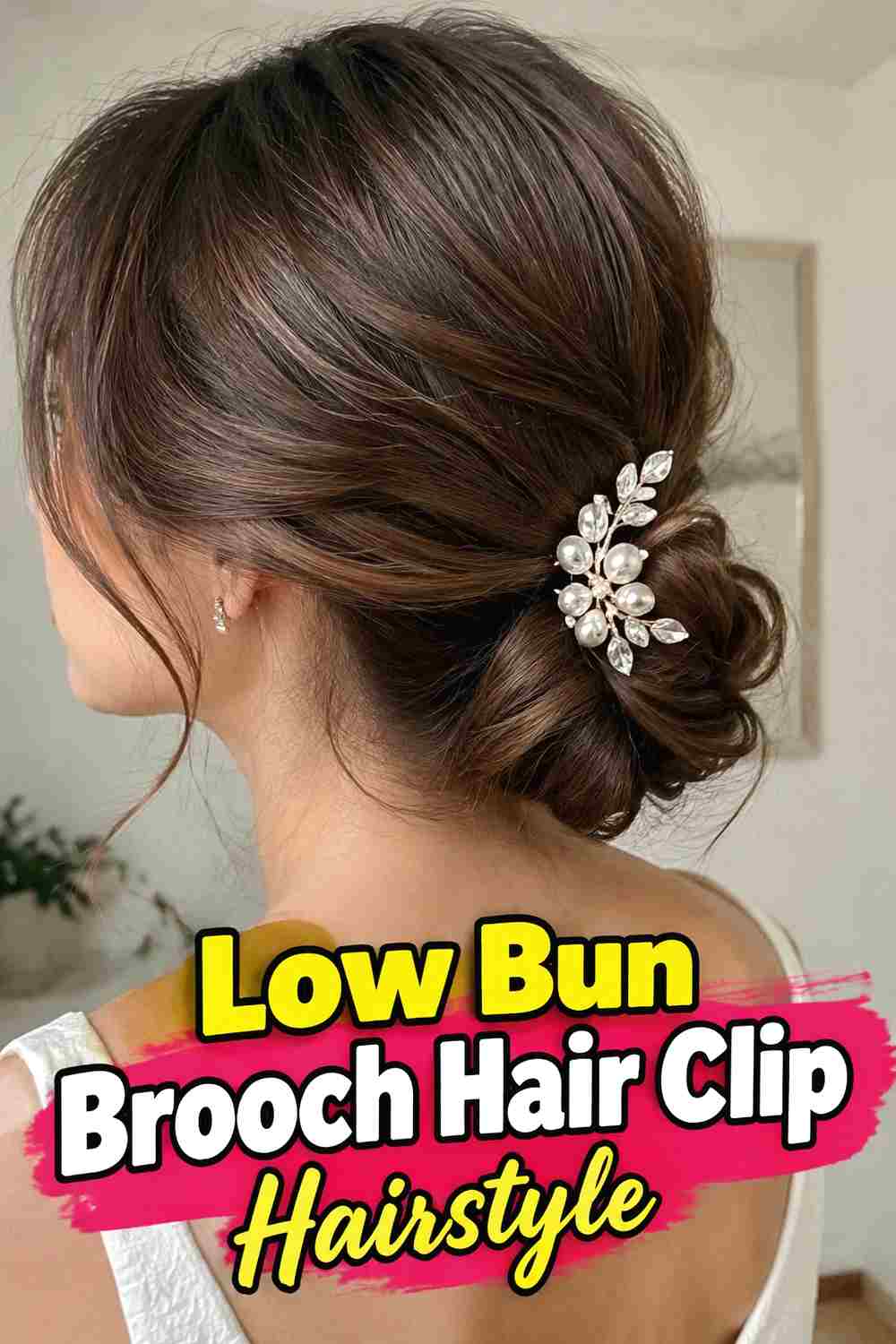 2. Low Bun Brooch Hair Clip Hairstyle