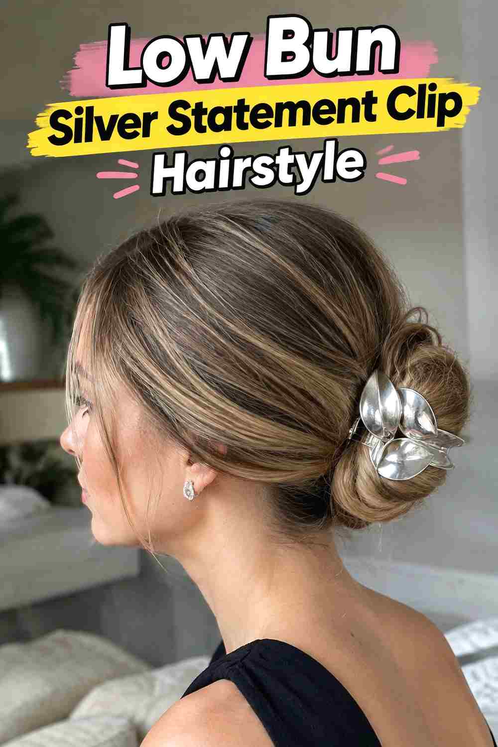 2. Low Bun Silver Statement Clip Hairstyle