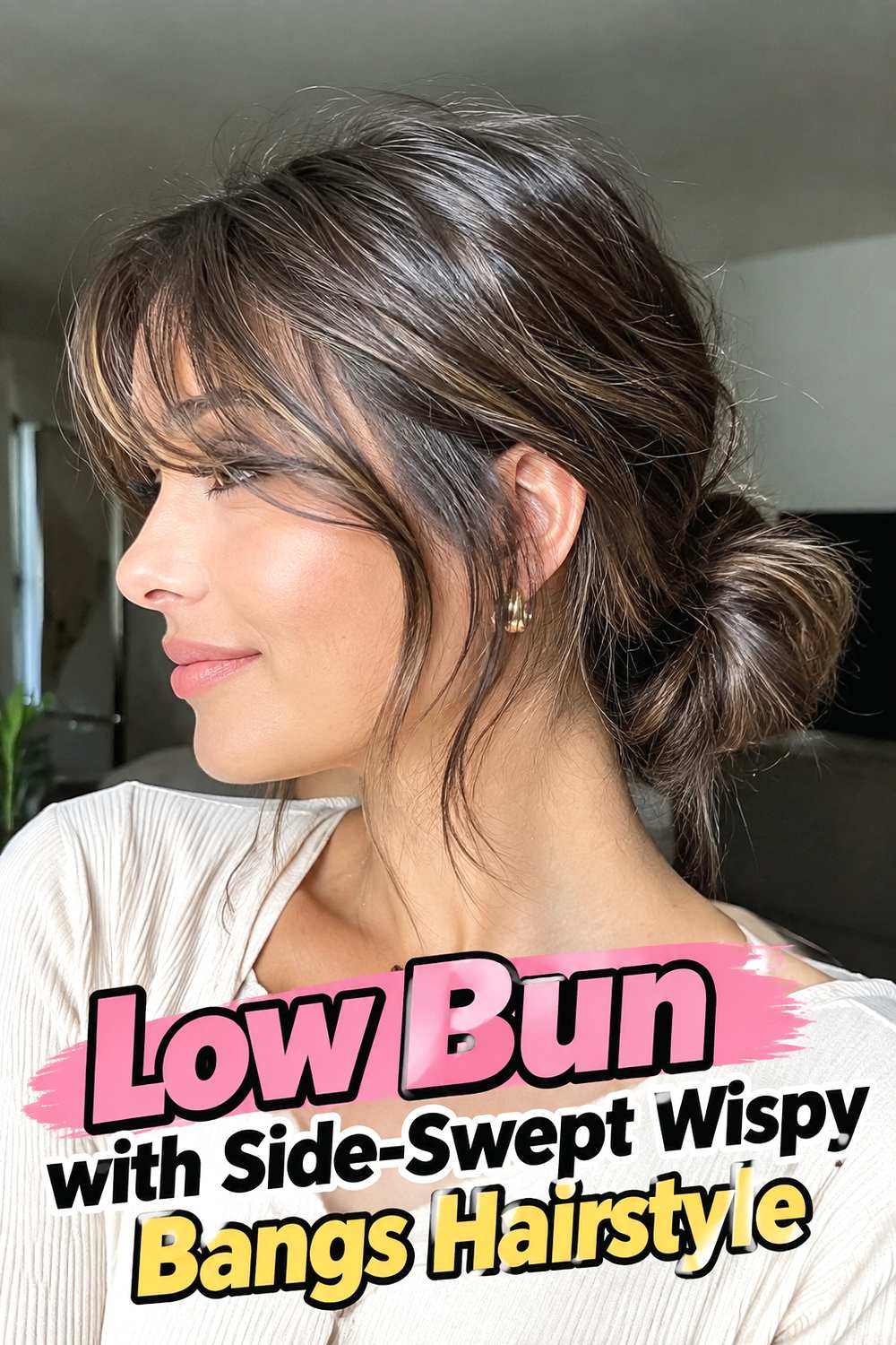 11. Low Bun With Side Swept Wispy Bangs Hairstyle