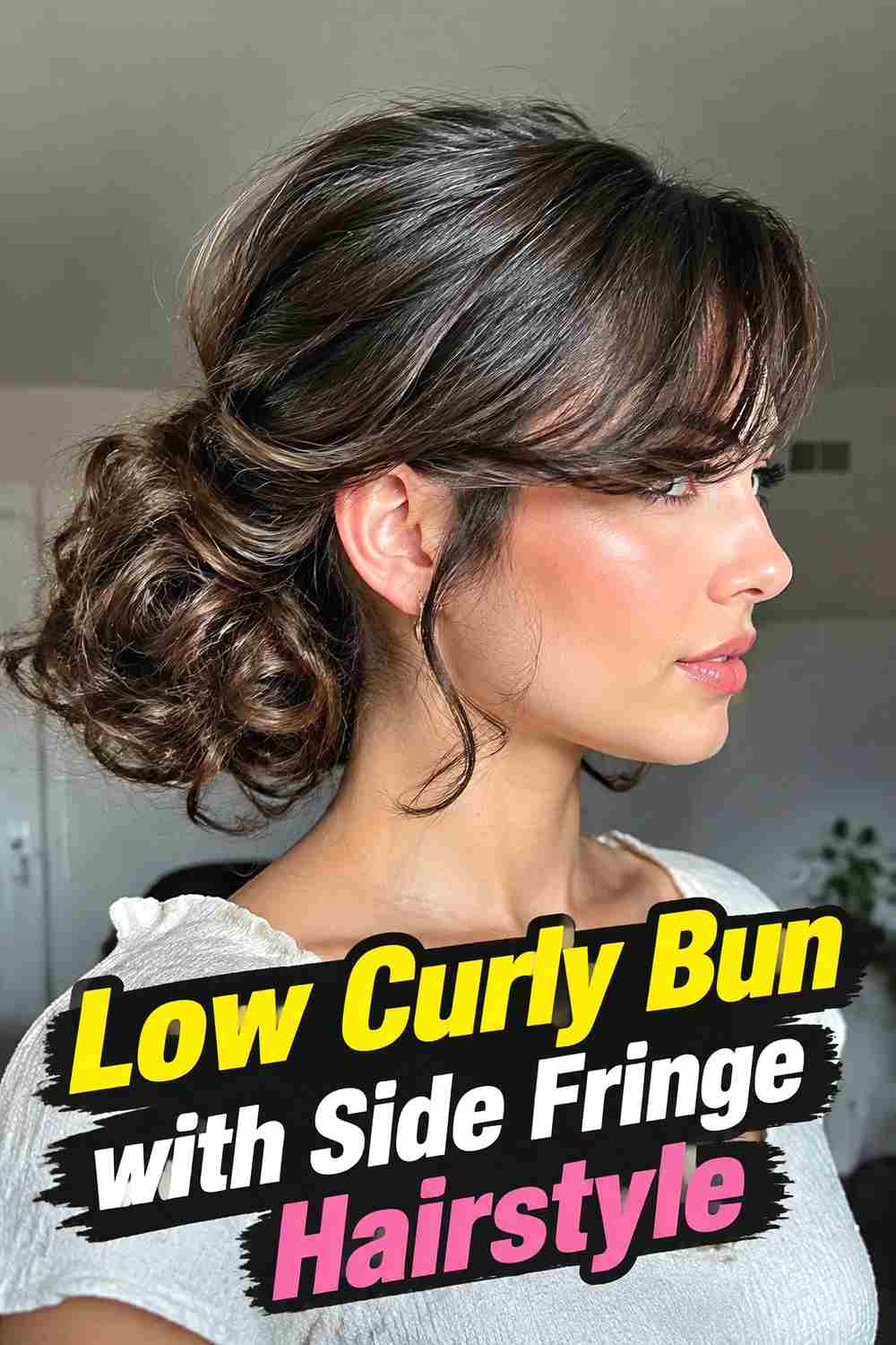 11. Low Curly Bun With Side Fringe Hairstyle