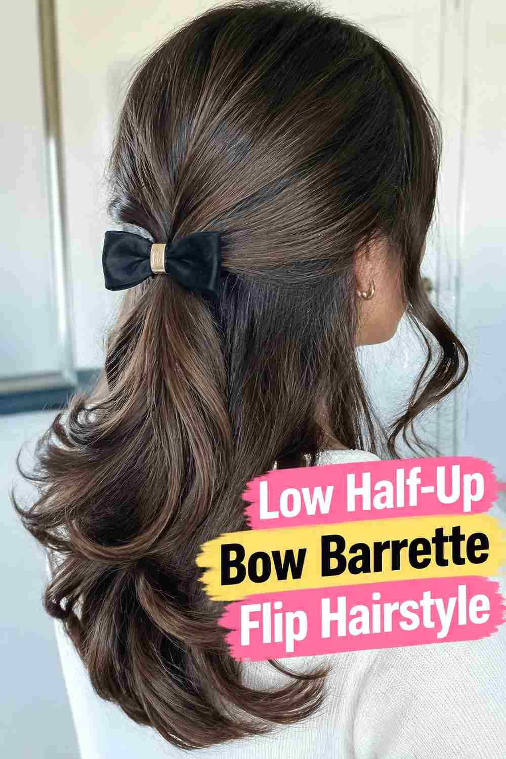 8. Low Half Up Bow Barrette Flip Hairstyle