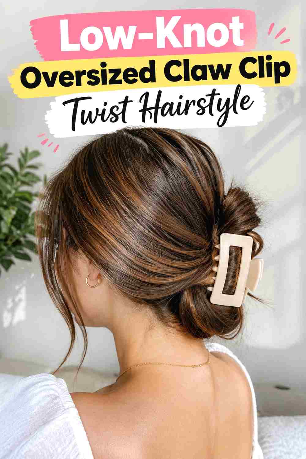 15. Low Knot Oversized Claw Clip Twist Hairstyle