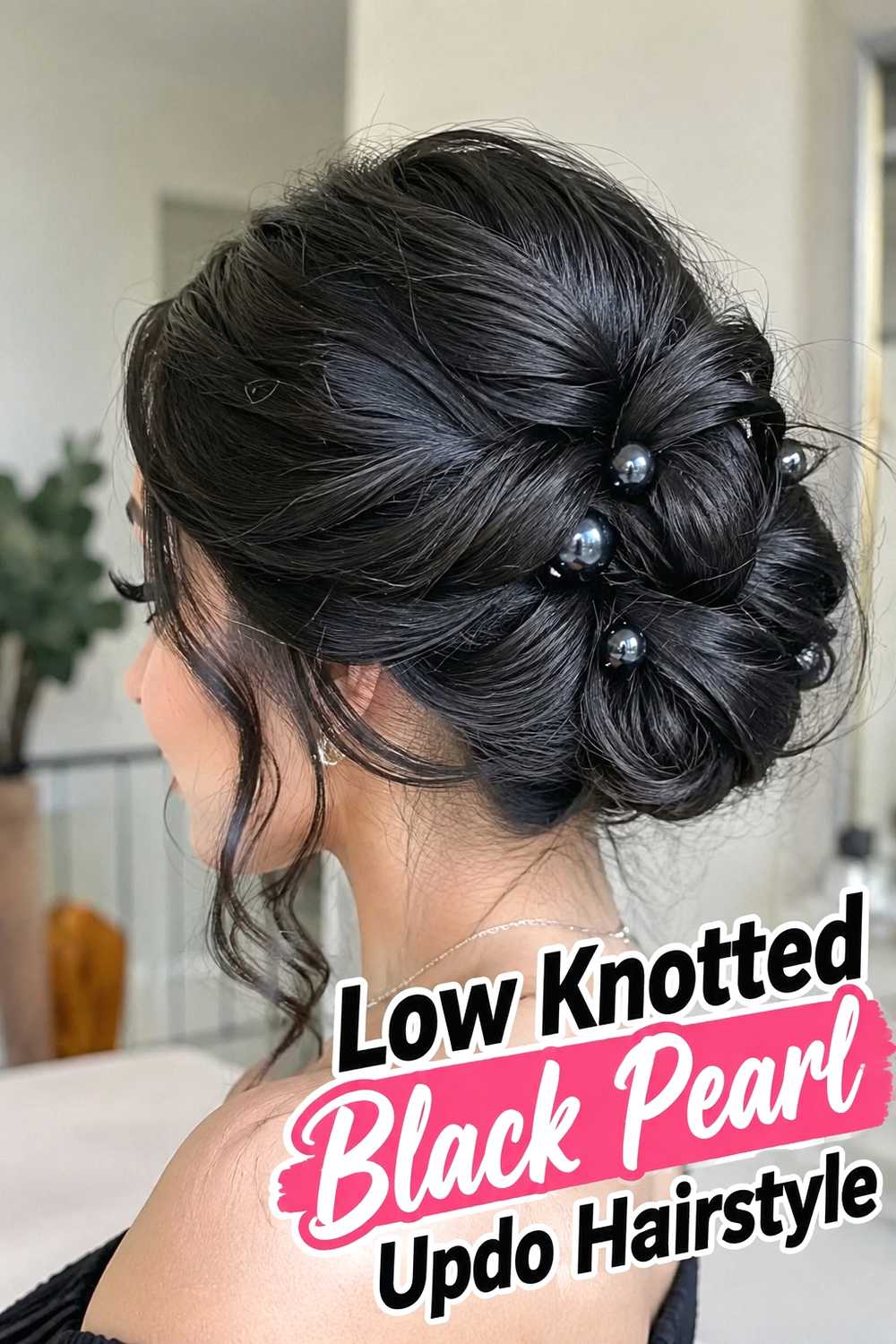 12. Low Knotted Black Pearl Updo Hairstyle