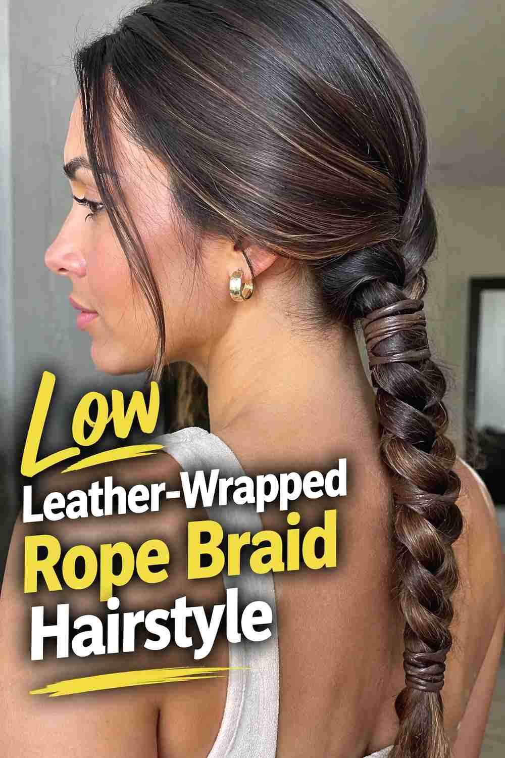 6. Low Leather Wrapped Rope Braid Hairstyle