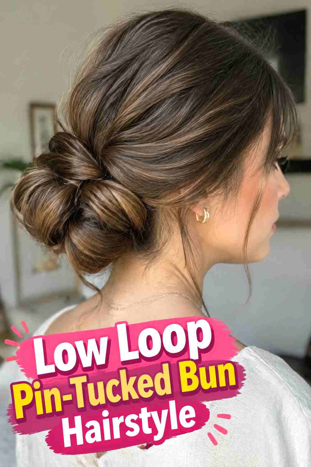 6. Low Loop Pin Tucked Bun Hairstyle