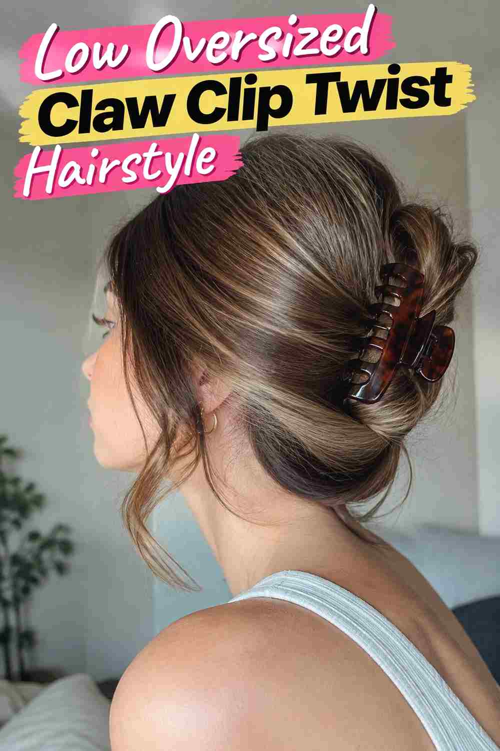 3. Low Oversized Claw Clip Twist Hairstyle