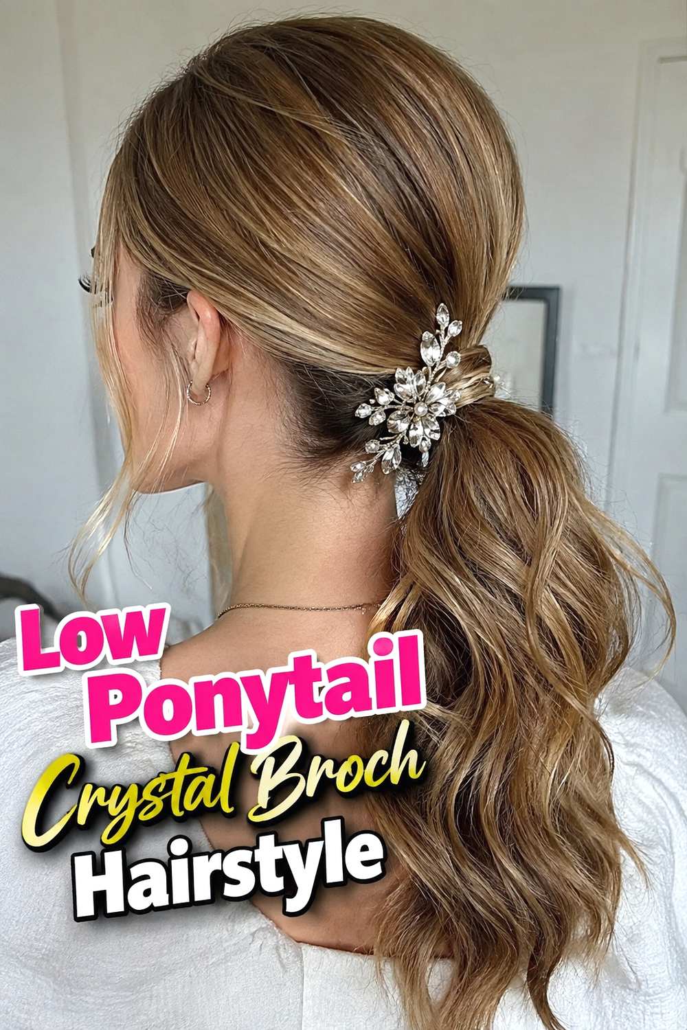 8. Low Ponytail Crystal Brooch Hairstyle